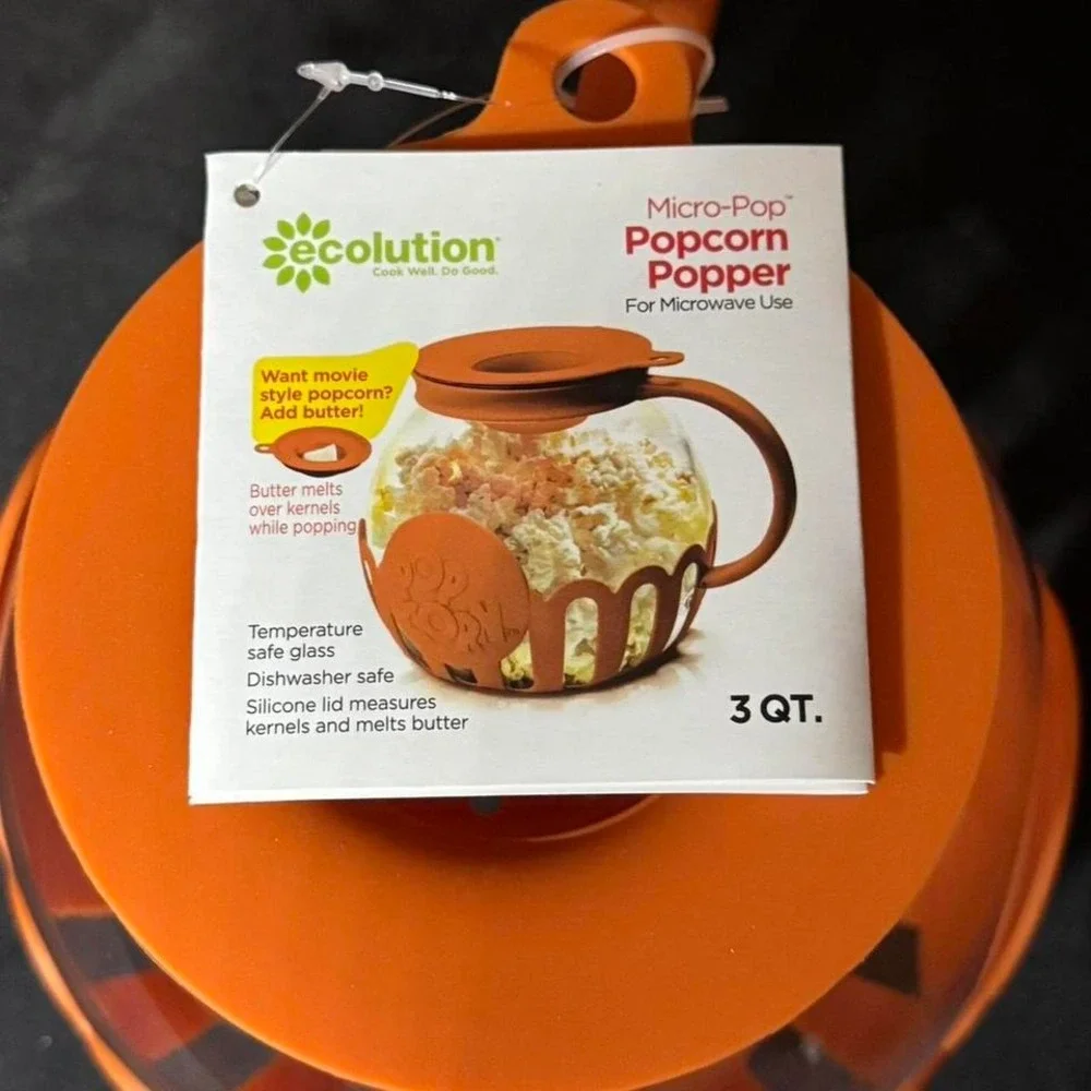 Orange popcorn popper with‎ lid and 3 Qt. capacity